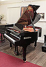 Piano for sale. A pre-owned, Wendl and Lung Model 161 grand piano with a black case and polyester finish.