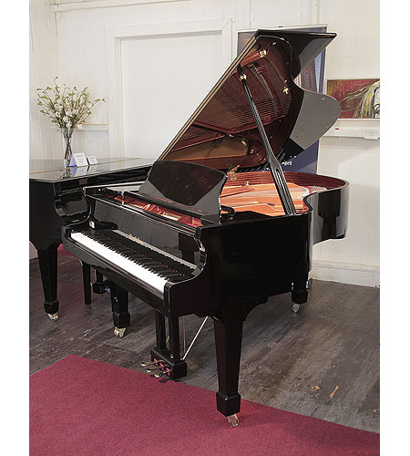 Pre-owned, Wendl and Lung Model 178 grand piano with a black case and polyester finish. Piano has an eighty-eight note keyboard and a three pedal lyre
