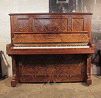 An 1894, Bechstein upright piano with a polished, burr walnut case
