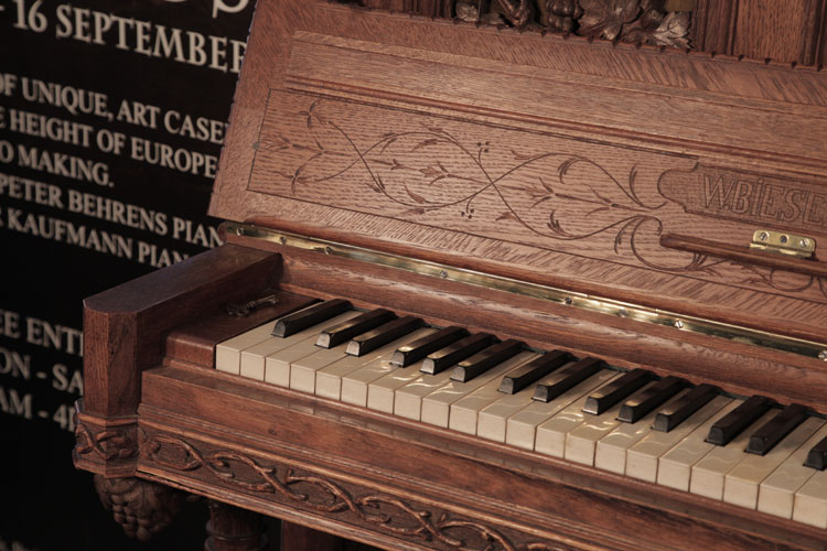 Biese Hof piano fall featuring carved, sylised flowers