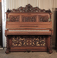 Renaissance style, Biese Hof upright piano for sale with an ornately carved, mahogany case and barley sugar legs