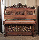 Piano for sale. Renaissance style, Biese Hof upright piano for sale with an ornately carved, mahogany case and barley sugar legs