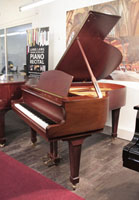A 1983, W. Hoffmann Model 173 grand piano for sale with a mahogany case and spade legs. Piano has an eighty-eight note keyboard and a two-pedal lyre..