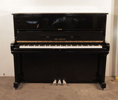 Karl Muller Upright Piano For Sale with a Black Case and Brass Fittings.