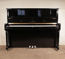  Karl Muller Upright Piano For Sale with a Black Case and Brass Fittings. Piano has an eighty-eight note keyboard and three pedals.