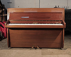 A 1960, Knight upright piano for sale with a polished, mahogany case . Piano has an eighty-eight note keyboard and and two pedals