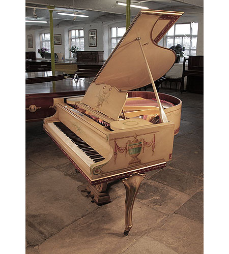 Circa 1910, Beuloff baby grand piano for sale with a cream case. Entire cabinet hand-painted with Classical style motifs. It is signed on the cabinet by Jade 85 Wigmore Street. 