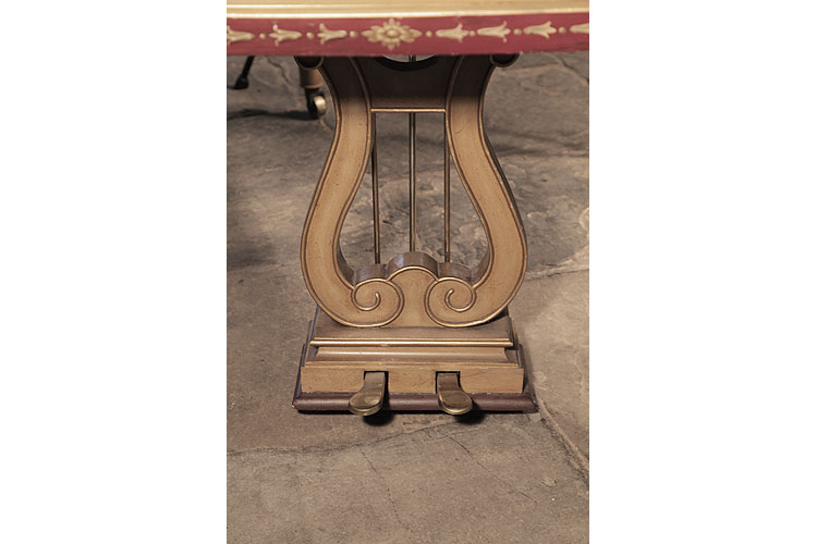 Beuloff traditionally shaped two-pedal piano lyre with carved volutes and gilt accents