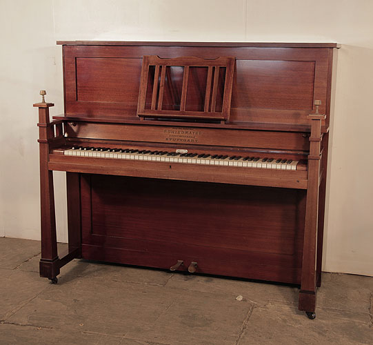 SArts and Crafts style, 1905, Schiedmayer upright piano for sale with a mahogany case and sculptural candlesticks