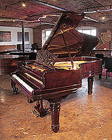 An 1899, Steinway Model B grand piano for sale with a rosewood case, filigree music desk and fluted, barrel legs