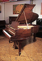 Rebuilt 1930, Steinway Model M Grand Piano For Sale with a Polished, Mahogany Case and Spade Legs 
