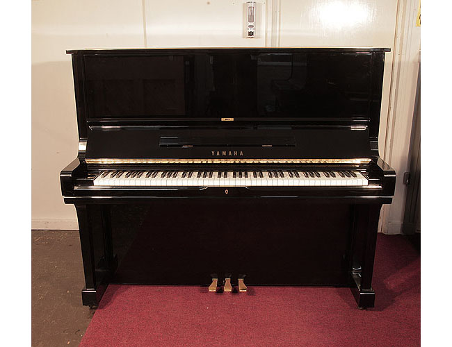Reconditioned, 1984, Yamaha U3 upright piano for sale with a black case and brass fittings. Piano has an eighty-eight note keyboard and three pedals. .