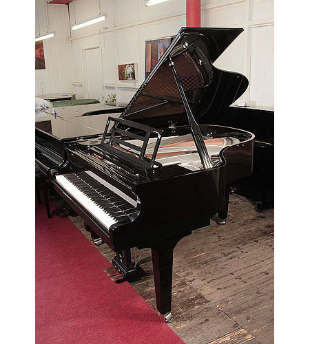 Brand new, Feurich Model 179 Dynamic II grand piano with a black case, openwork music desk and gun metal frame.   Piano has an eighty-eight note keyboard and a three-pedal piano lyre. 