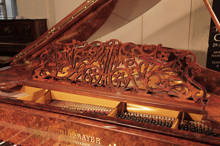 Schiedmayer music desk in an openwork arabesque design featuring scrolling tendrils, foliage and flowers 