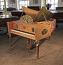 Piano for sale. A 1918, Soren Jensen grand piano for sale with a maple case, ornately carved music desk and bronze nude, caryatid legs. Cabinet features hand-painted ovals by Gudmund Hentze. 