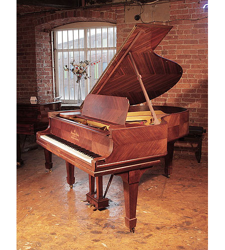 A 1905, Steinway Model A grand piano for sale with a quartered, kingswood case and spade legs. Piano has an eighty-eight note keyboard and a two-pedal lyre. 