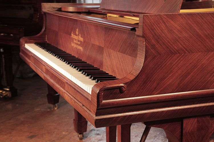 Steinway Model O piano cheek with linear case moulding ending in a curlicue 