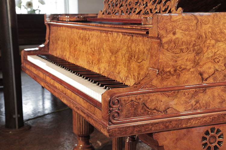Steinway Model D antique styled,  serpentine piano cheek features double linear moulding ending in a carved, curlicue