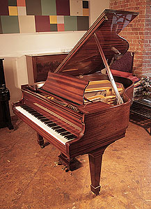 A 1966, Steinway Model S baby grand piano with a mahogany case and spade legs. Piano has an eighty-eight note keyboard and a two-pedal lyre. 