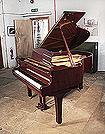 Piano for sale. Reconditioned, 1989, Yamaha G2 grand piano for sale with a black case and spade legs