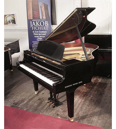 Reconditioned, 1988, Yamaha GH1 baby grand piano for sale with a black case and square, tapered legs