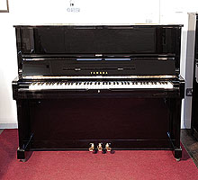 Reconditioned,  1976, Yamaha U1 upright piano with a black case and polyester finish