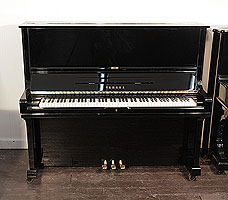 A 1980, Yamaha U3 upright piano for sale with a black case and brass fittings