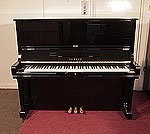 Piano for sale. Reconditioneds 1984, Yamaha U3 upright piano for sale with a black case and brass fittings. Piano has an eighty-eight note keyboard and three pedals.  