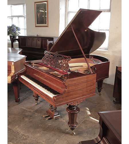 Antique, Bechstein model V grand piano for sale with a rosewood case and turned, faceted legs. Piano has an eighty-eight note keyboard and a two-pedal lyre.   