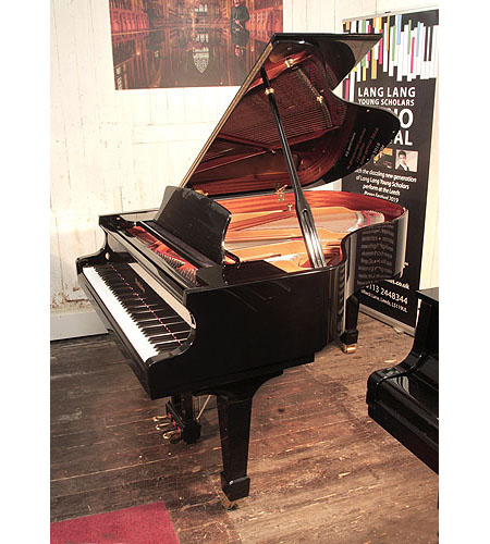 Reconditioned, 2004, Wendl and Lung Model 178 grand piano with a black case and polyester finish. Piano has an eighty-eight note keyboard and a three pedal lyre 