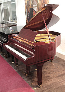 Reconditioned, 1989, Yamaha G1 baby grand piano with a mahogany case and spade legs
