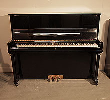 Piano for sale. Young Chang E-118 Upright Piano For Sale with a Black Case and Brass Fittings