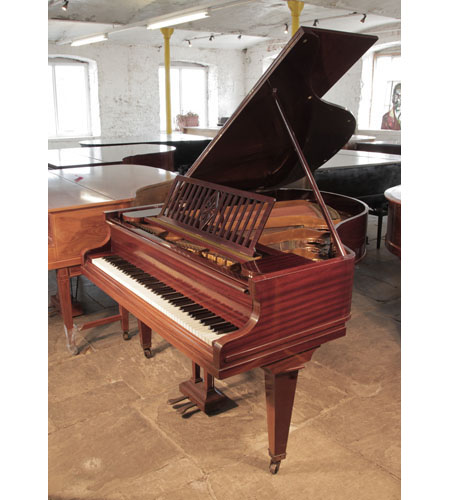 A 1928, Bechstein Model L grand piano for sale with a mahogany case and square, tapered legs
