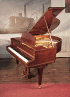 Reconditioned, 1932, Bluthner baby grand piano for sale with a mahogany case and square, tapered legs Piano has an eighty-eight note keyboard and a three-pedal lyre. 