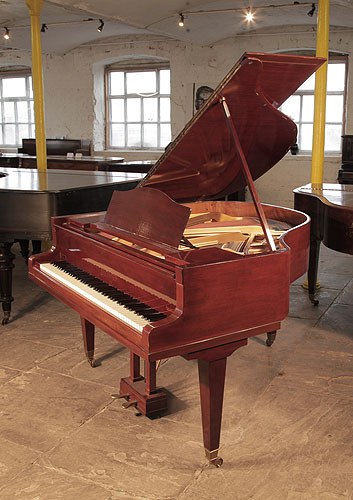 A 1932, Bluthner   baby  grand piano for sale with a mahogany case  and square, tapered  legs.
