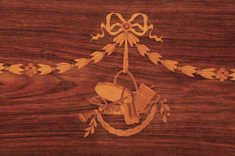 Broadwood cabinet inlay featuring swagged bellflowers tied with a bow and pendent musical instruments
