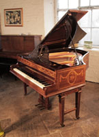 A 1903, Broadwood grand piano with a rosewood case and gate legs. Cabinet inlaid with swags, bows and musical instruments