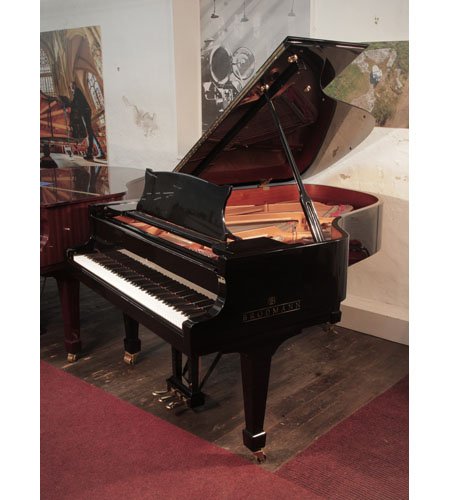 Reconditioned, 2014, Brodmann BG-187 grand piano for sale with a black case and spade legs. Piano has an eighty-eight note keyboard and a three-pedal lyre. 