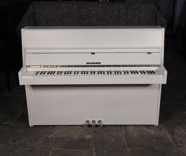  Pre-owned, 1979, Fazer upright piano with a matt, white case and brass fittings.