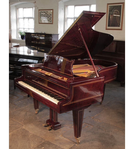 Restored, 1910, Grotrian Steinweg grand piano for sale with a mahogany case and satinwood stringing accents. Piano has square tapered legs. Piano has an eighty-eight note keyboard and a two-pedal lyre.