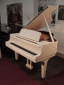 A 2018, Kawai GL-10 baby grand piano for sale with a white case and square, tapered legs