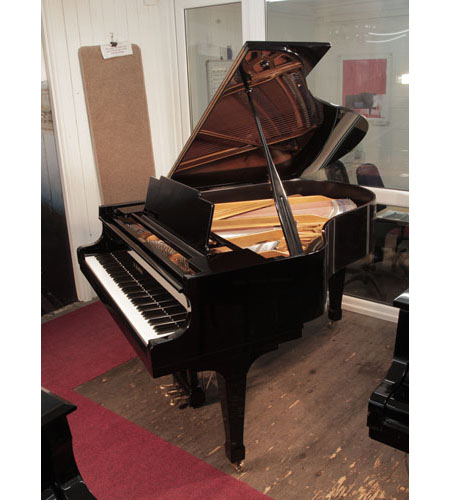 Reconditioned, 1976, Kawai KG-2C grand piano for sale with a black case and spade legs. Piano has an eighty-eight note keyboard and a three-pedal lyre. 
 