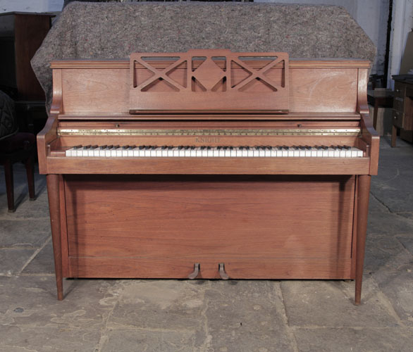  Pre-owned, 1970, Knight upright piano with a mahogany case and cut-out music desk.