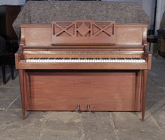 Pre-owned, 1970, Knight upright piano with a mahogany case and cut-out music desk. Piano has an eighty-eight note keyboard and two pedals.