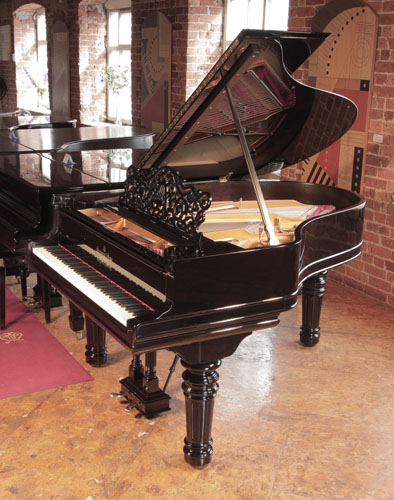 Rebuilt, 1895, Steinway Model A grand piano for sale with a black case, filigree music desk and fluted, barrel legs.