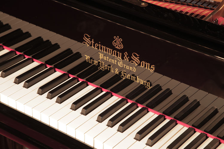 Steinway manufacturer's name inlaid on fall. We are looking for Steinway pianos any age or condition.