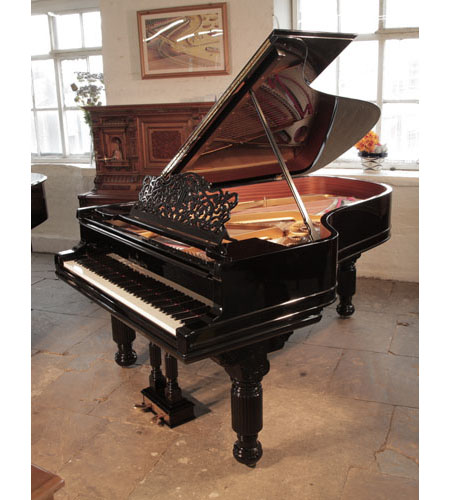 Rebuilt, 1886, Steinway Model B grand piano for sale with a black case and fluted, barrel legs. Piano has an eighty-five note keyboard and a two-pedal lyre. 