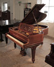 Piano for sale. Bespoke 1903, Steinway Model O grand piano for sale with a polished, rosewood case and music desk featuring cut-out hearts