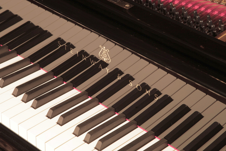  Steinway  Model O manufacturers logo on fall. We are looking for Steinway pianos any age or condition.