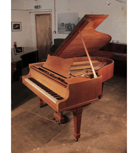 Reconditioned, 1932, Steinway Model O grand piano for sale with a satin, walnut case and spade legs. Piano has an eighty-eight note keyboard and a two-pedal lyre. 